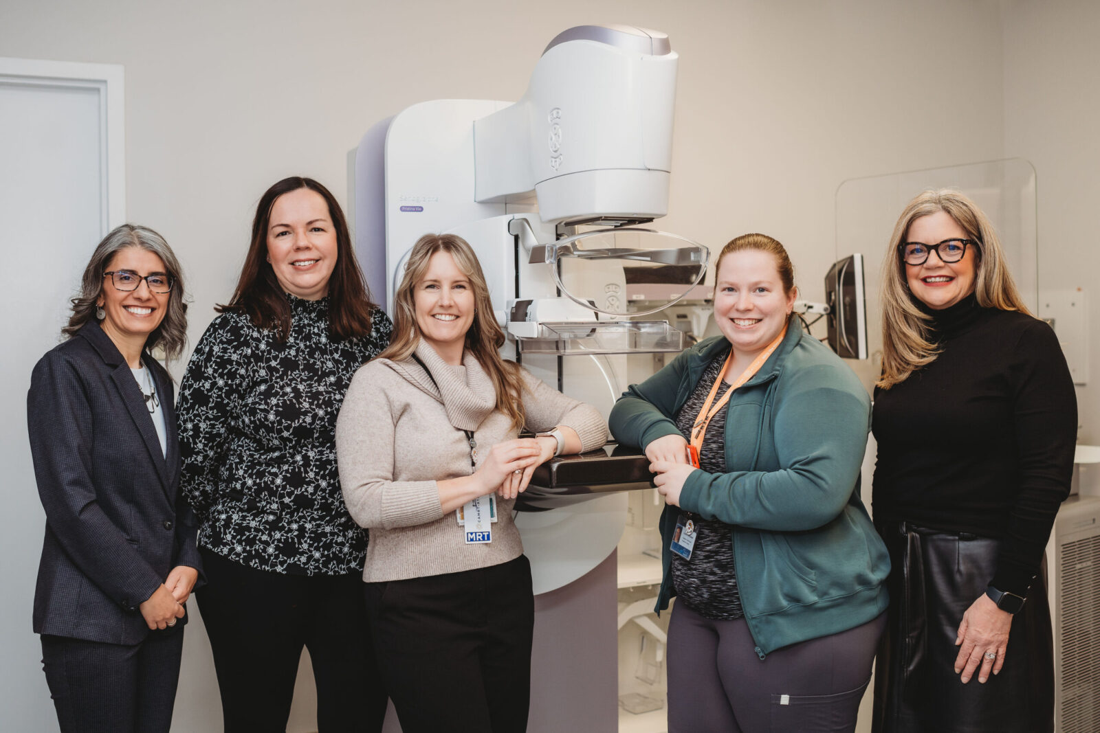 Representatives of Aberdeen Health Foundation and clinical teams are photographed with new 3D Digital Mammography equipment.