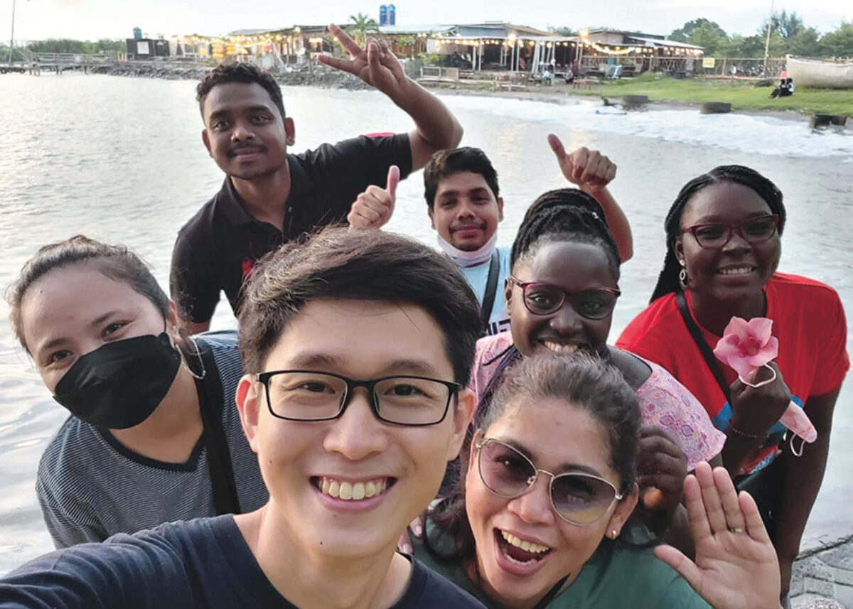 Young people taking a selfie, smiling