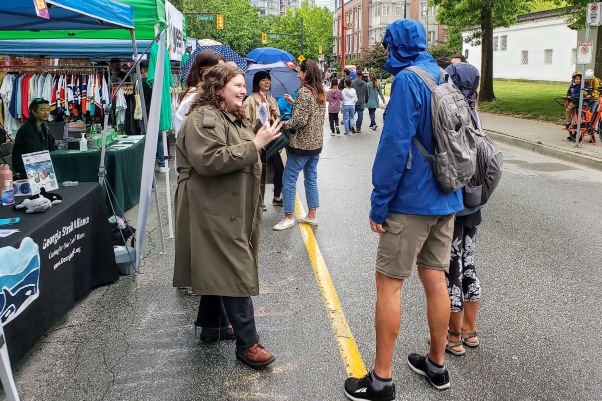 Dana Taylor engaging with an event participant